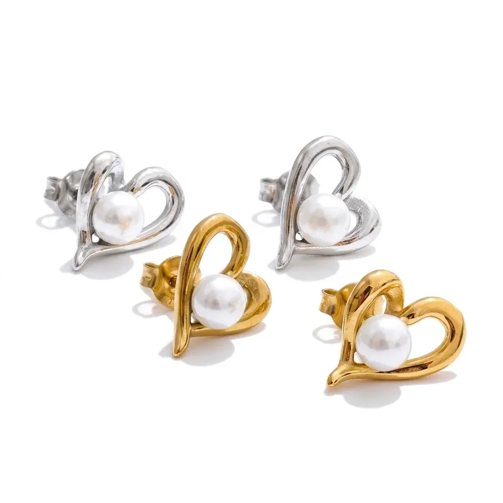 Heart pearl stud earrings in silver and gold
