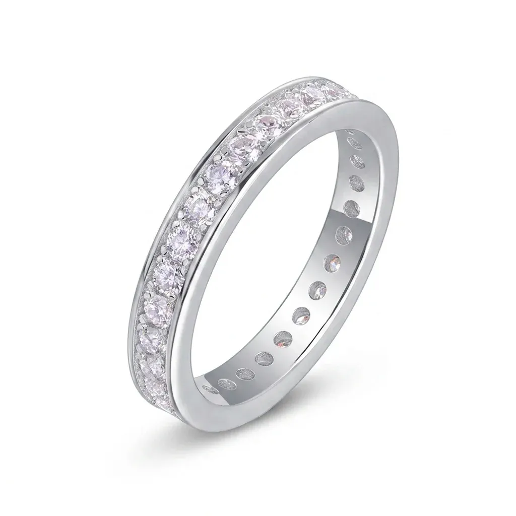 Silver moissanite eternity band ring studio photo