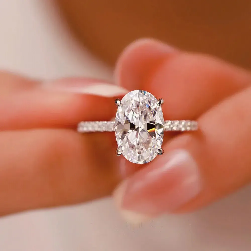 Knobspin Certified Oval Moissanite Sterling Silver Ring